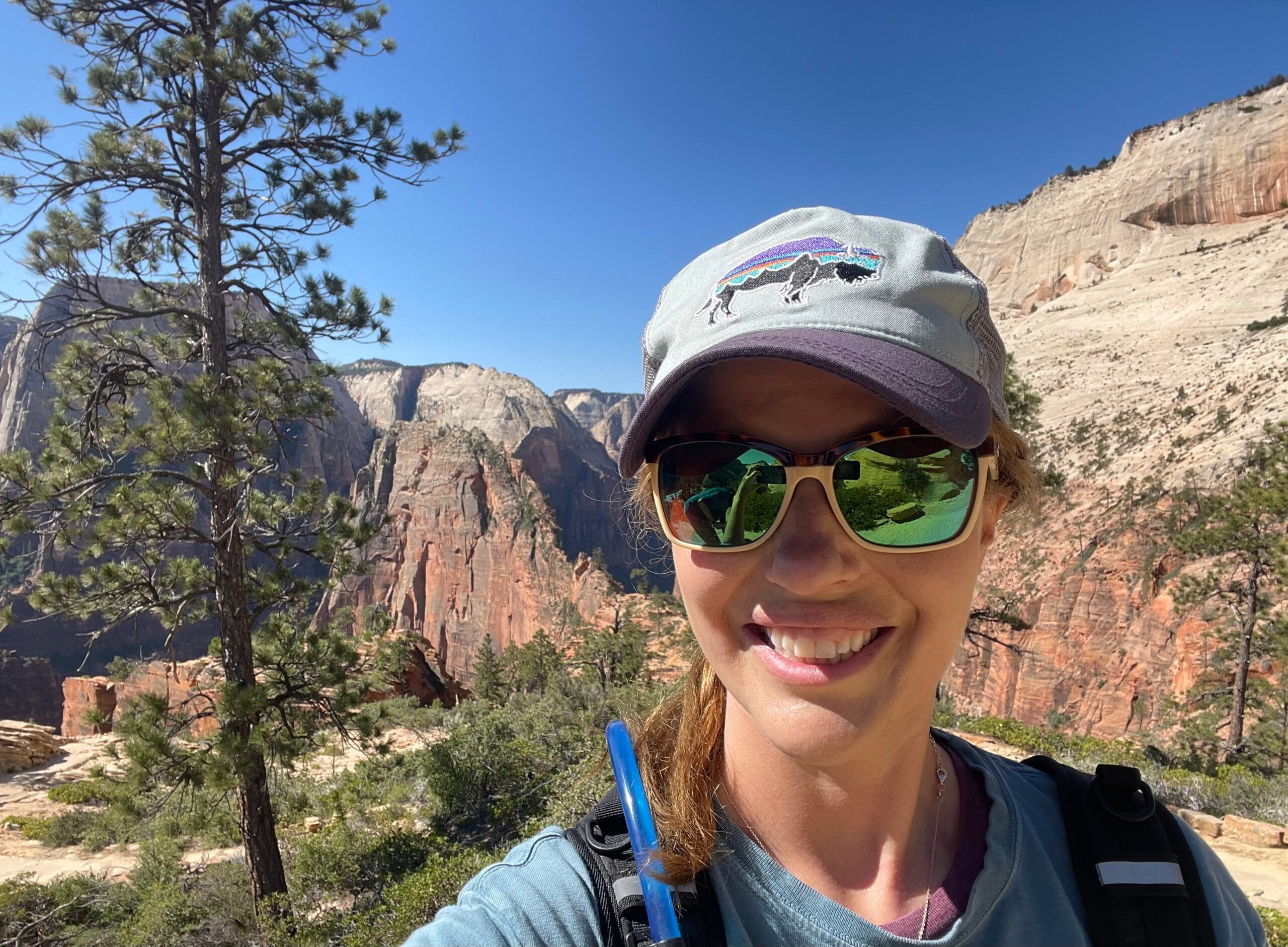 Photo of Brooke Carlson with mountains behind her